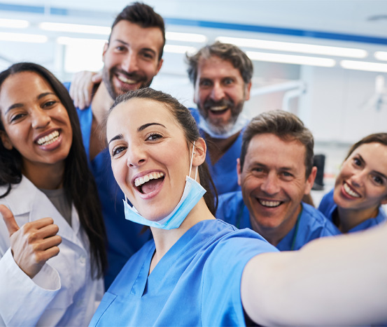 Doctor and hygienists taking a selfie