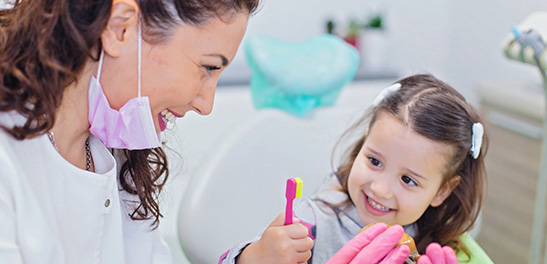 Pediatric Dentist with a young patient